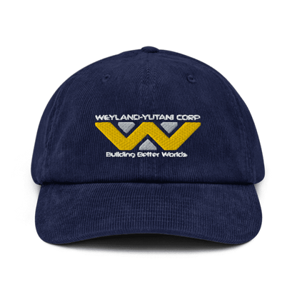 A navy blue baseball cap features an embroidered Weyland-Yutani Corp logo and the phrase "Building Better Worlds.