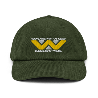 A green baseball cap features an embroidered Weyland-Yutani Corp logo with the tagline "Building Better Worlds.