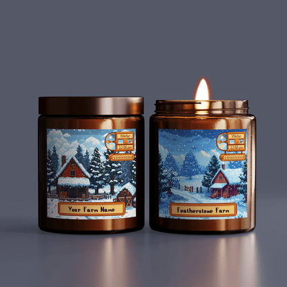 Two Stardew Valley scented candles are displayed side-by-side, each featuring a pixelated illustration of a snowy farm scene and personalized labels reading "Your Farm Name" and "Featherstone Farm.