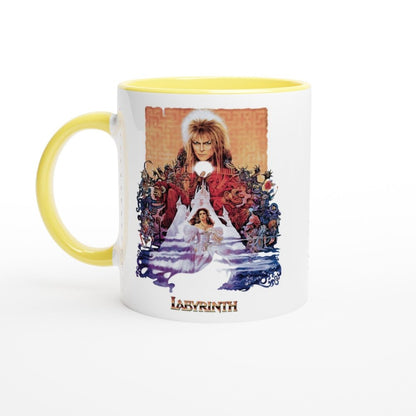 A white mug features a fantasy-themed illustration from the 1986 Labyrinth movie, depicting Jareth and Sarah in front of a labyrinth design.