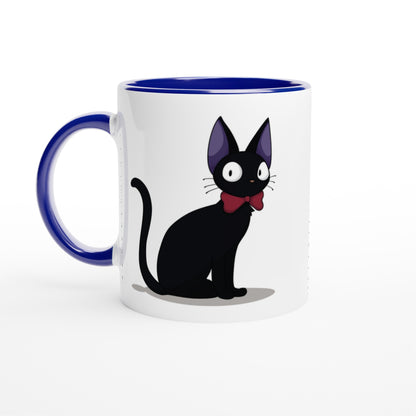 A white mug with a blue interior and handle features an illustration of Gigi the Cat from Kiki's Delivery Service, wearing a red bow tie.