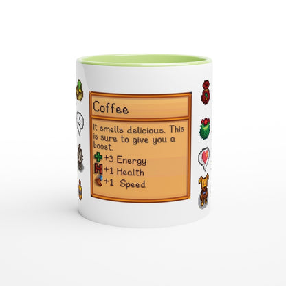 A white mug featuring a Stardew Drinks pattern with colourful sprites and a coffee beverage card displaying stats for energy, health, and speed.