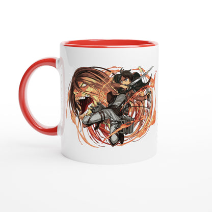 A white ceramic mug displays an illustration of Eren Yeager from Attack on Titan wielding a sword against a titan background.