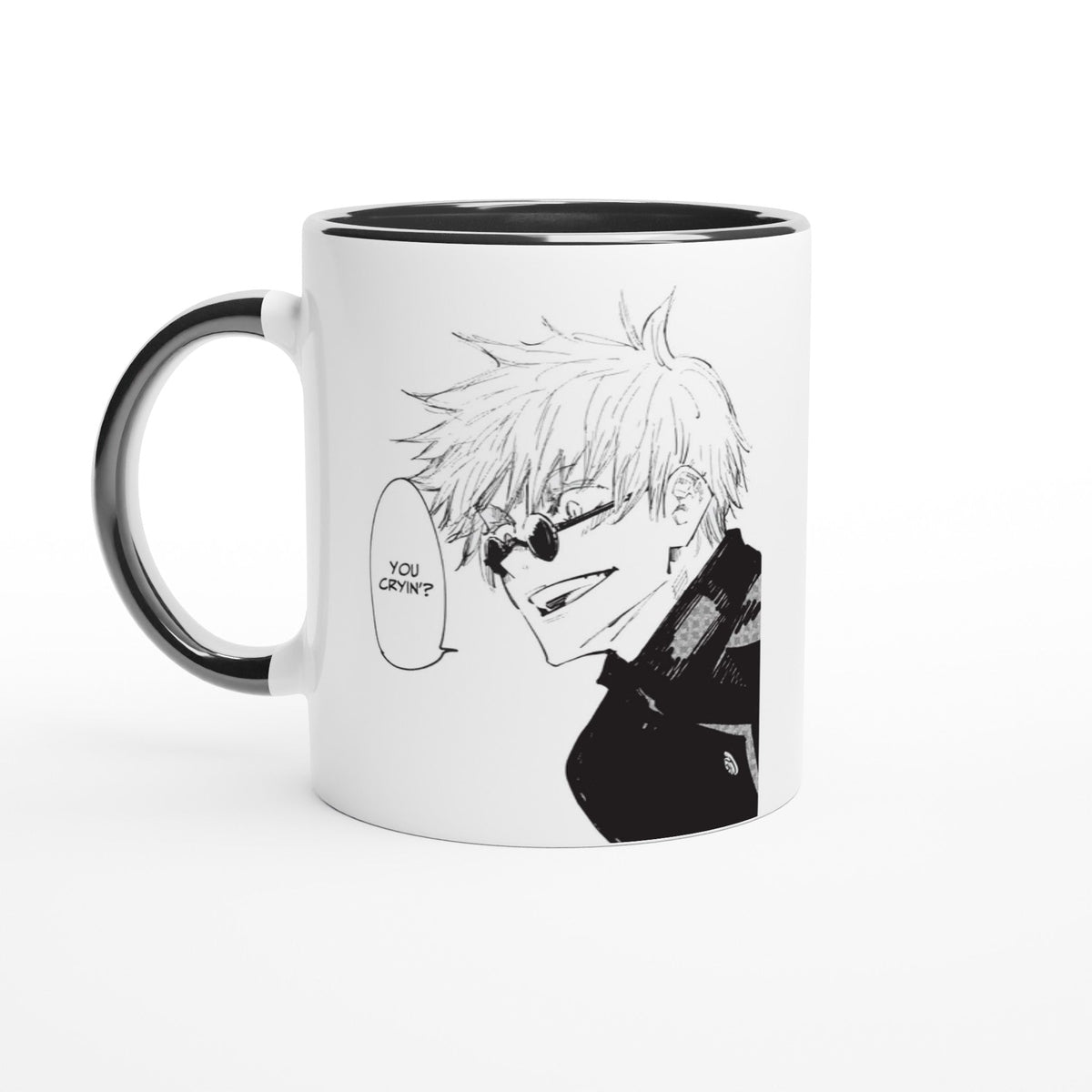 A black and white ceramic mug depicts a manga panel of Satoru Gojo from Jujutsu Kaisen with speech bubble reading "You Cryin'?".