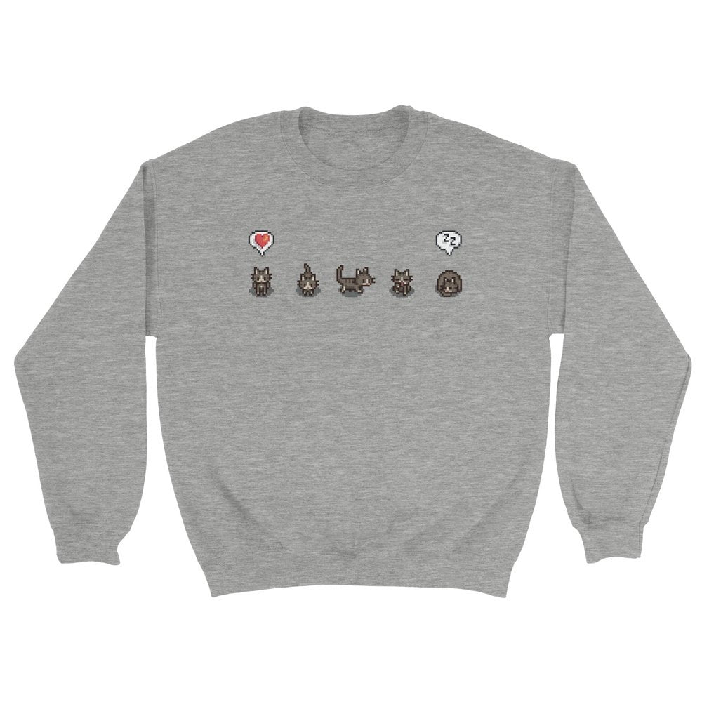 A grey Stardew Valley jumper displays pixelated cats and emotes across the chest.