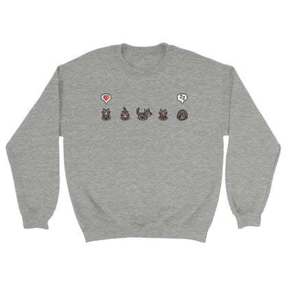 A grey Stardew Valley jumper displays pixelated cats and emotes across the chest.