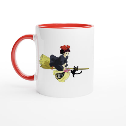 The white mug depicts Kiki from Kiki's Delivery Service riding a flying broomstick with her cat Gigi, inspired by Studio Ghibli.