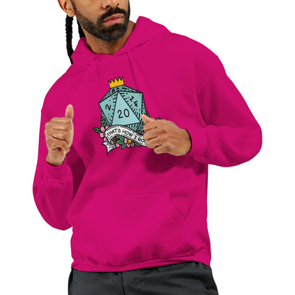 A man wearing a pink D&D hoodie displays a graphic of a D20 die with floral accents and the phrase "That's How I Roll.