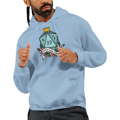 A man wearing a light blue D&D hoodie displays a graphic of a D20 die with the phrase "That's How I Roll" printed on it.