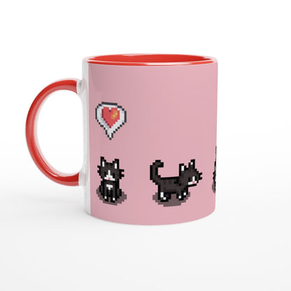 A white mug with a pink background features pixelated graphics of tuxedo cats and a heart emote inspired by the Stardew Valley computer game.