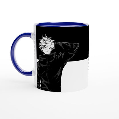 A white mug features a black and white illustration depicting Satoru Gojo from Jujutsu Kaisen in a dynamic pose against a yin/yang-inspired background.