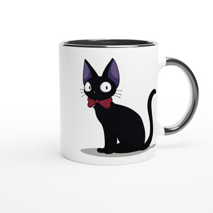 A white mug displays an illustration of Gigi the Cat, a black cat with purple ears and a red bow tie, inspired by Studio Ghibli's Kiki's Delivery Service.