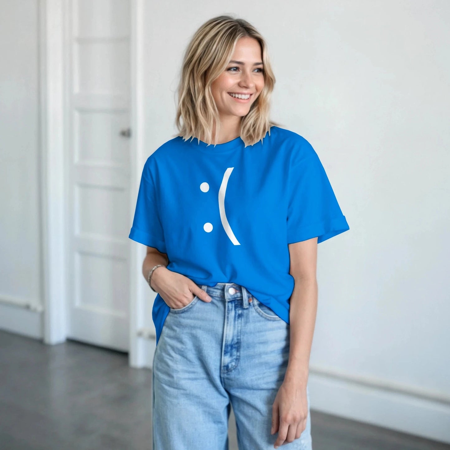 A person wearing a blue Gildan® 5000 t-shirt featuring a white sad face icon reminiscent of the classic Windows Blue Screen of Death error.