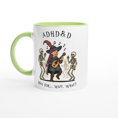 A white mug with a green handle and interior features cartoon illustrations of a D&D bard playing music for skeletons, along with the words "ADHD & D" and "Roll For... Wait, What?".