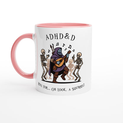 A white mug with a pink handle features cartoon illustrations of skeletons dancing around a D&D bard playing a lute, accompanied by the words "ADHD & D" and "Roll for... Oh look, a squirrel!