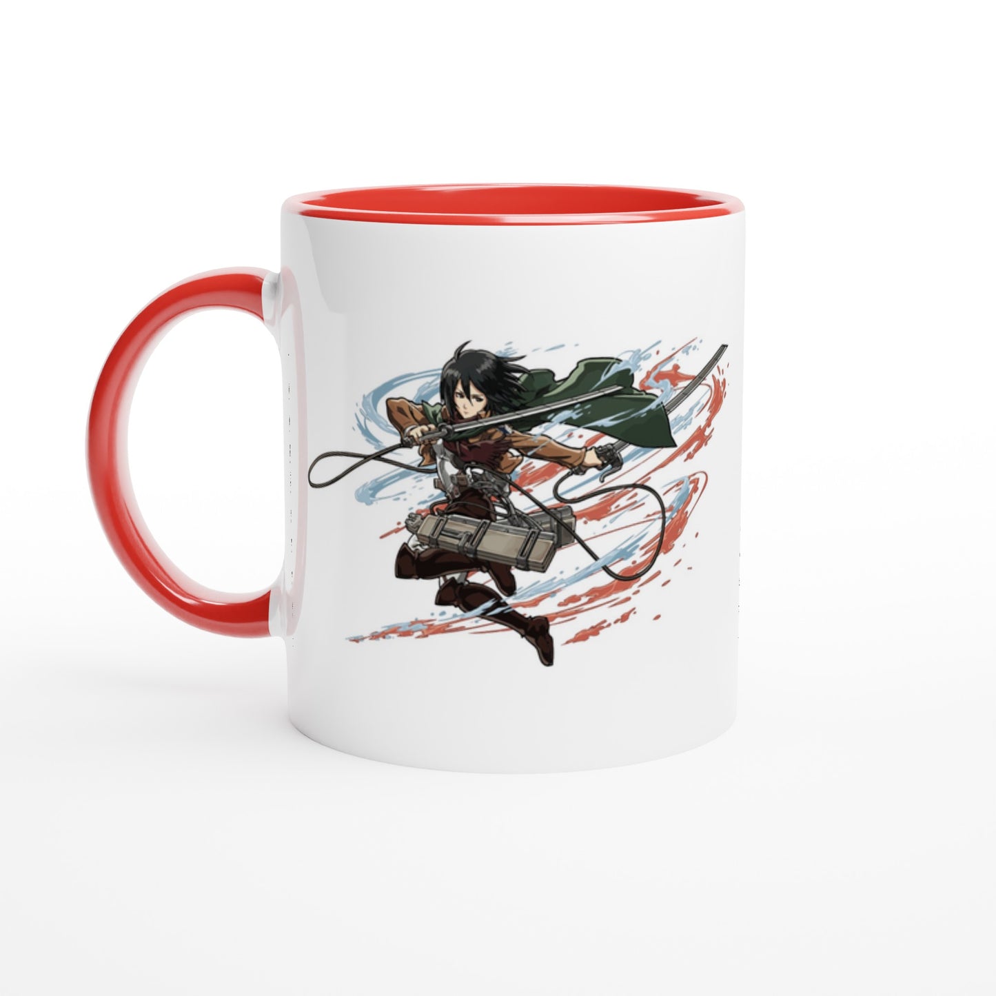 A white ceramic mug displays an illustration of Mikasa Ackerman from the Attack on Titan anime, posed dynamically with her signature gear.