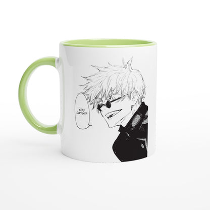A white ceramic mug features black and white comic art depicting Satoru Gojo from Jujutsu Kaisen with a speech bubble reading You Cryin'?