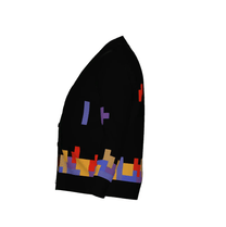 Side view of a black knitted cardigan featuring colorful Tetromino game block patterns along the bottom hem.