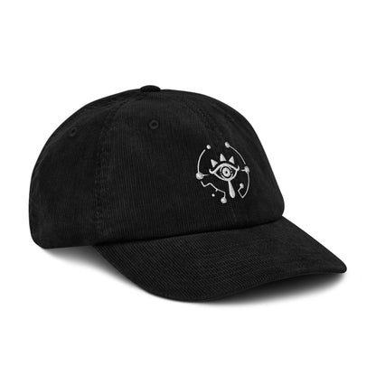 A black Zelda Sheikah embroidered cap features a glow-in-the-dark design inspired by Tears of the Kingdom.