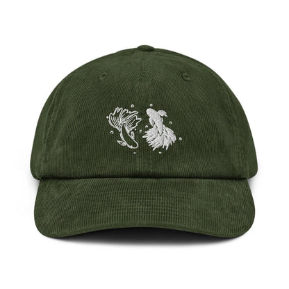 This dark green corduroy baseball cap features embroidered designs of a betta fish and a floral element, referencing elements from Jujutsu Kaisen.