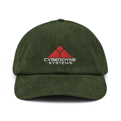 A green corduroy baseball cap displays a red Cyberdyne Systems logo embroidered on the front.