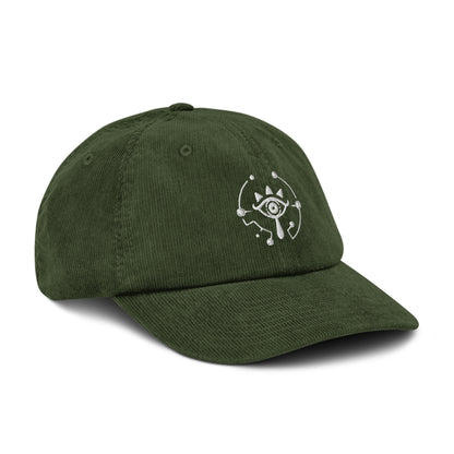 A green Zelda Sheikah embroidered cap features a white design inspired by Tears of the Kingdom.
