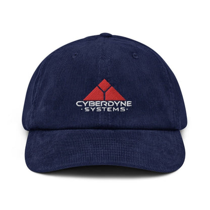 A navy blue corduroy baseball cap displays a white Cyberdyne Systems logo.