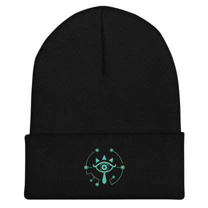 A black knitted beanie features a glow-in-the-dark embroidered Sheikah eye design inspired by Tears of the Kingdom.