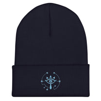A dark blue Zelda Sheikah embroidered beanie features a glow-in-the-dark design inspired by Tears of the Kingdom.