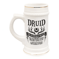 A white ceramic tankard features gold accents and displays "Druid" along with nature-themed graphics related to the D&D character class.