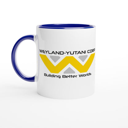 A white mug features the Weyland-Yutani Corporation logo and slogan "Building Better Worlds" in yellow lettering against a blue interior rim.