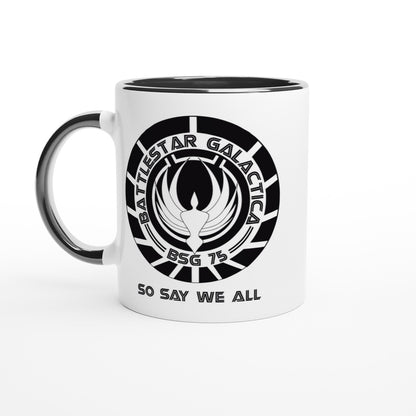 A white mug displays the Battlestar Galactica emblem with "BSG 75" and "So Say We All" printed around it.