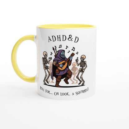A white mug with a yellow handle features an illustration of a D&D bard playing a lute while dancing skeletons surround him, accompanied by the words "ADHD & D" and "Roll for... Oh look, a squirrel!".
