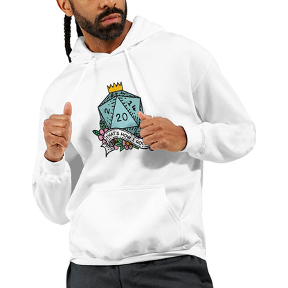 A man wearing a white D&D hoodie displays a graphic of a D20 die with floral accents and the phrase "That's How I Roll.