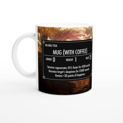 A white ceramic Skyrim coffee mug displays a graphic resembling an item card from the video game Elder Scrolls, featuring text and imagery related to the game.