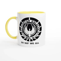 A white ceramic mug featuring the Battlestar Galactica BSG 75 logo and the phrase So Say We All in black text with a yellow interior and handle.