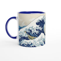A blue mug displays a reproduction of Hokusai's Great Wave off Kanagawa featuring Link from The Legend of Zelda: Wind Waker sailing within it.