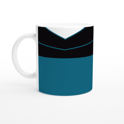 A white mug displays a design inspired by Star Trek: The Next Generation uniforms featuring black and teal horizontal stripes.
