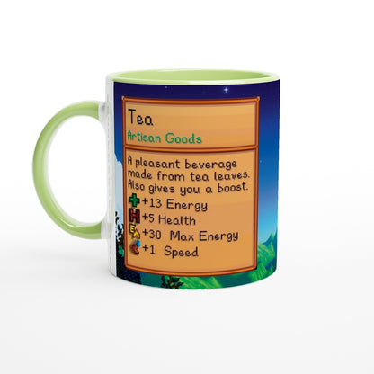 A Stardew Custom Farm mug displays a graphic of tea artisan goods with details about its energy and health benefits.
