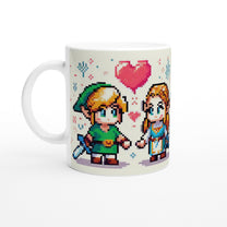 A white mug displays a chibi pixel art illustration of Link and Zelda from The Legend of Zelda looking at each other with a heart above them.