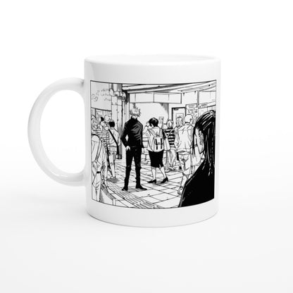 A white ceramic mug displays a black and white manga panel depicting Satoru Gojo and Suguru Geto in a tense scene from Jujutsu Kaisen.
