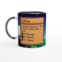 A white ceramic mug featuring a Stardew Valley pixel art interface box that describes Coffee as smelling delicious and providing +3 Energy, +1 Health, and +1 Speed.