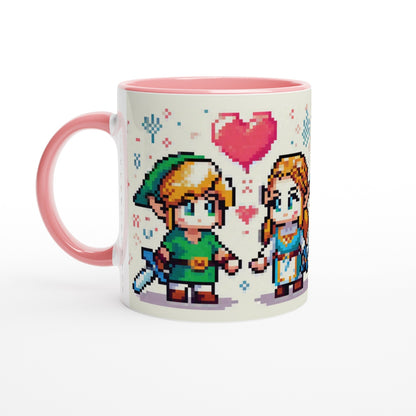 A pink mug displays chibi pixel art of Link and Zelda from The Legend of Zelda standing together with a heart above them.