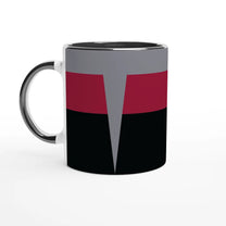 A white ceramic mug displays a design inspired by Star Trek DS9 uniforms featuring horizontal bands of gray, burgundy, and black.