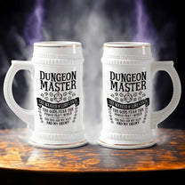 A white ceramic Dungeon Master tankard features gold accents and D&D-themed magic and imagery.