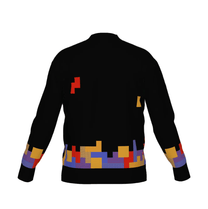 A black knit cardigan featuring a colorful Tetromino game pattern of falling blocks across the bottom hem and sleeves.