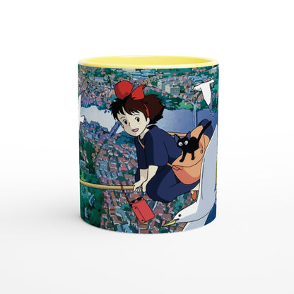 The Kiki's Delivery Service mug depicts Kiki flying over Koriko on a broomstick with her cat Gigi and a white seagull.