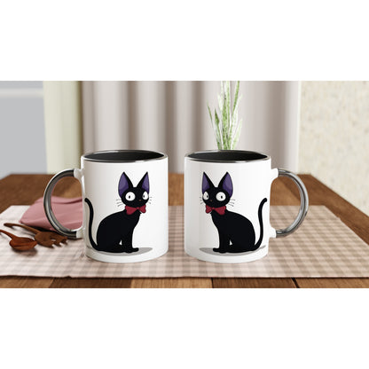 Two white mugs with black interiors feature an illustration of Gigi the Cat, inspired by Kiki's Delivery Service and Studio Ghibli.