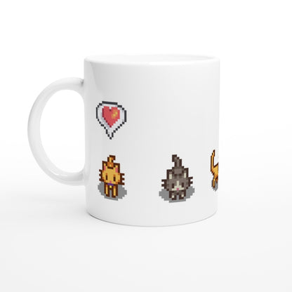 A white mug displays pixelated graphics of ginger and tabby cats alongside heart and lightning emotes from Stardew Valley.