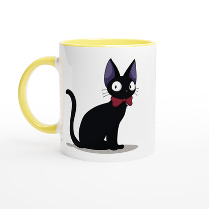 A white mug with a yellow handle and interior features an illustration of Gigi, the black cat from Kiki's Delivery Service.